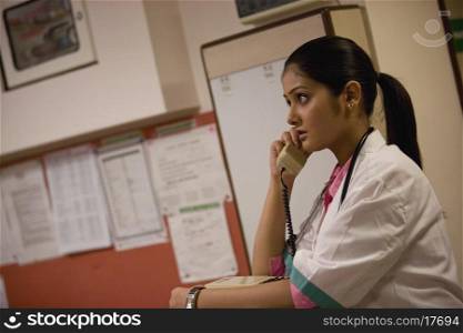 Doctor talking on the phone