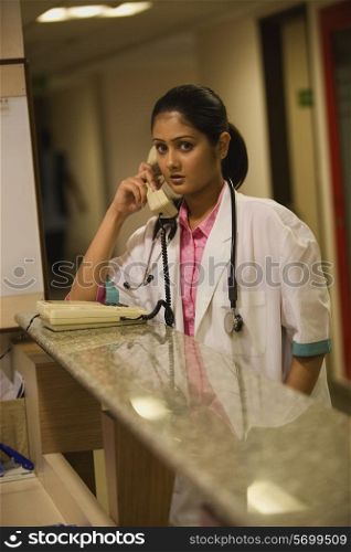 Doctor talking on the phone