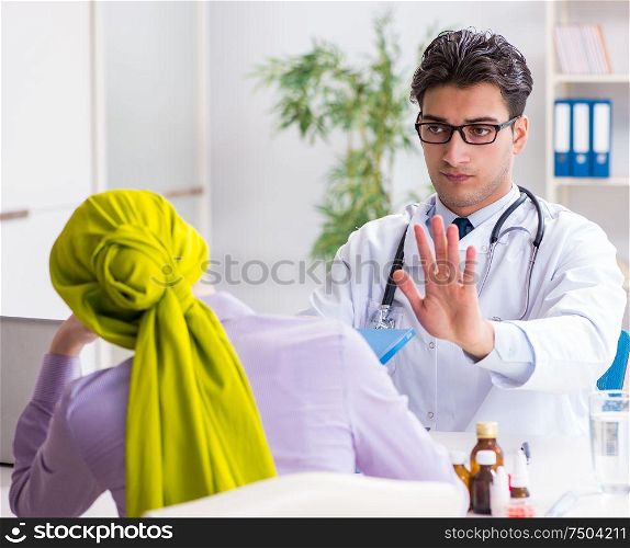 Doctor talking to cancer patient in hospital. The doctor talking to cancer patient in hospital