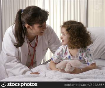 Doctor Talking to Little Girl Patient