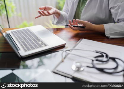 Doctor talking to online patient on laptop online consultation health treatment. medical appointment at home having online consultation.