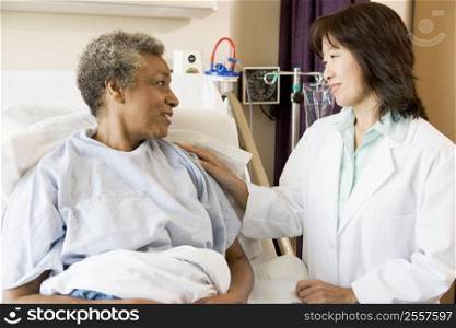 Doctor Talking To Senior Woman