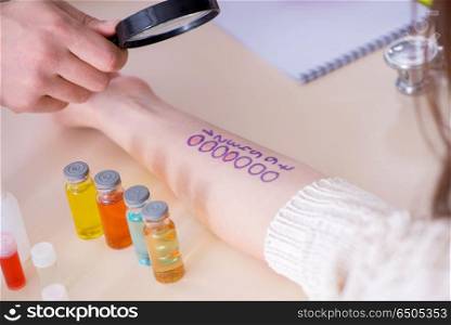 Doctor testing allergy reaction of patient in hospital