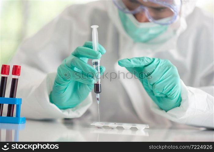 Doctor testing blood sample research vaccine Corona virus