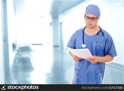 doctor thinking with his notes, at the hospital