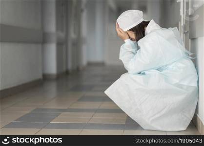 doctor tired after long shift hospital. Beautiful photo. doctor tired after long shift hospital