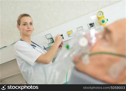 doctor using a machine on a patient