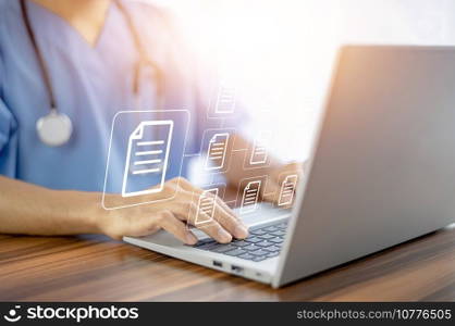 Doctor using computer Document Management System  DMS , online documentation database process automation to efficiently manage files
