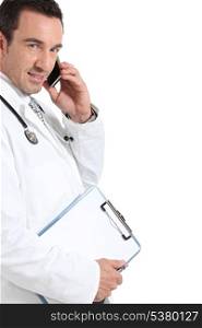 Doctor using his phone