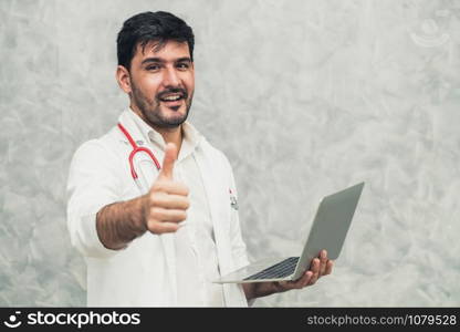 Doctor using laptop computer at the hospital. Medical healthcare and doctor staff service.