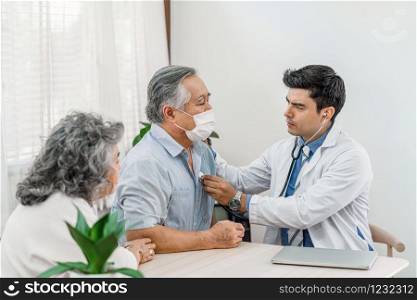 Doctor using stethoscope for auscultate Asian grandparent patient in house, service Life insurance at home, healthcare with Long live and Elderly society, Prevent epidemic concept