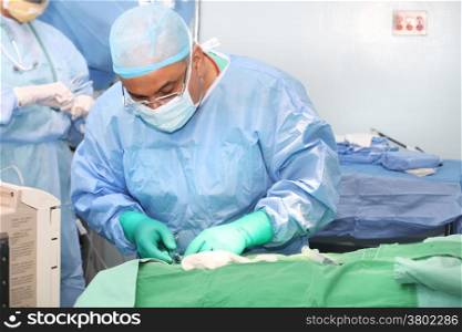 Doctor using tools in a surgery
