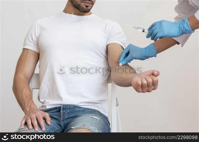 doctor vaccinating patient