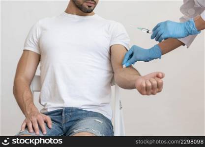 doctor vaccinating patient