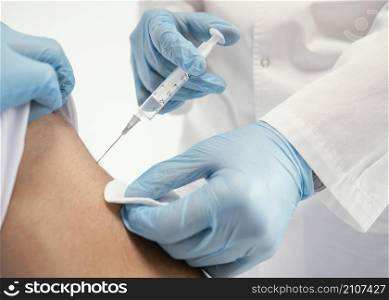 doctor vaccinating patient clinic