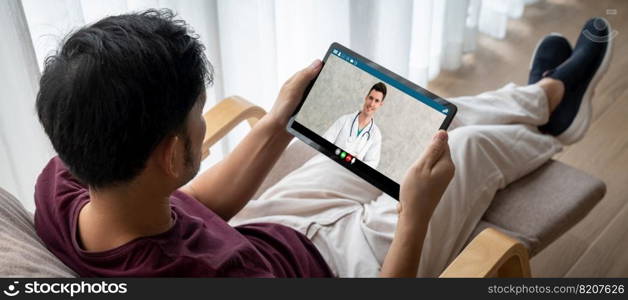 Doctor video call online by modish telemedicine software application for virtual meeting with patient. Doctor video call online by modish telemedicine software application