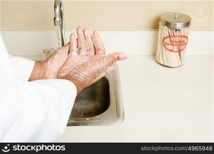 doctor washing his hands
