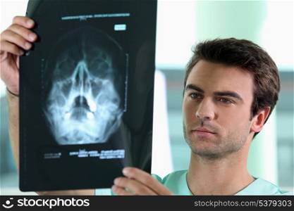 doctor watching X-ray