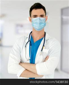Doctor wear face mask in hospital protect from coronavirus disease or COVID-19. Medical staff are high risk people to receive infection from coronavirus disease or COVID-19.
