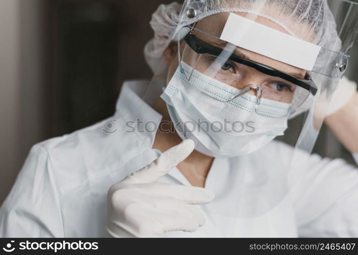 doctor wearing face mask protective goggles 3