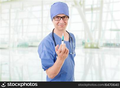 doctor with a syringe at the hospital. doctor