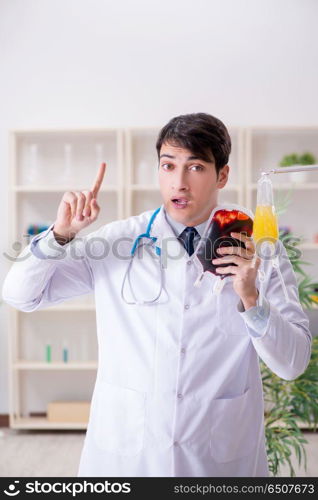 Doctor with bag of blood plasma in hospital