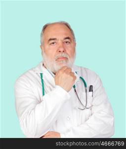 Doctor with beard and gray hair thinking on green background