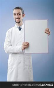 Doctor with blank message board
