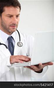 Doctor with computer