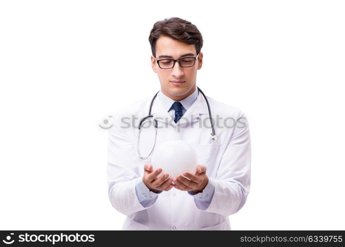 Doctor with crystal ball isolated on white background