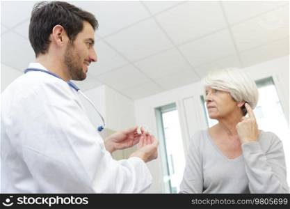 doctor with female senior patient