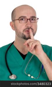 Doctor with finger to lips for silence isolated on white background