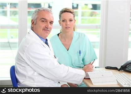 Doctor with his assistant