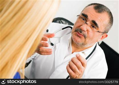Doctor with his patient in a consultation