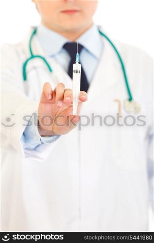 Doctor with medical syringe in hands isolated on white. Close-up.&#xA;