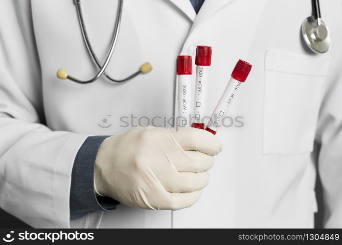 doctor with paper posing coronavirus alert