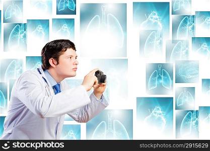 Doctor with photo camera
