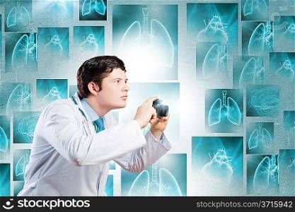 Doctor with photo camera