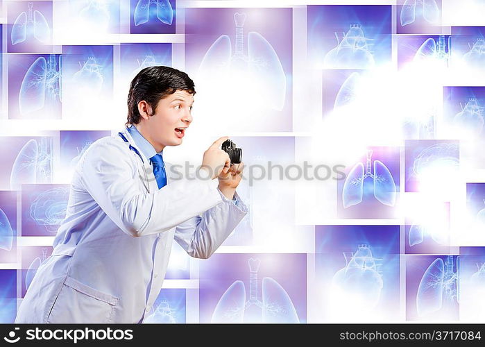 Doctor with photo camera