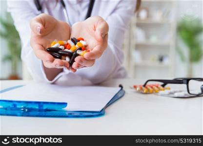 Doctor with pills working in hospital