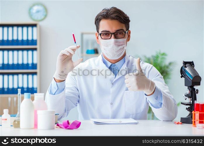 Doctor with red blood sample