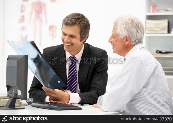 Doctor with senior patient