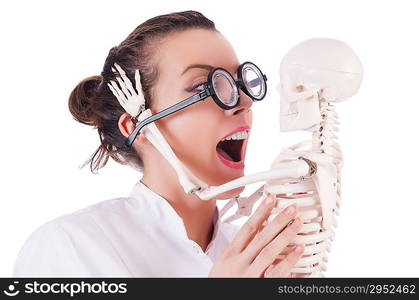 Doctor with skeleton on white