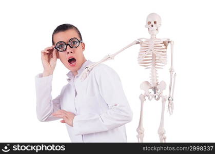 Doctor with skeleton on white