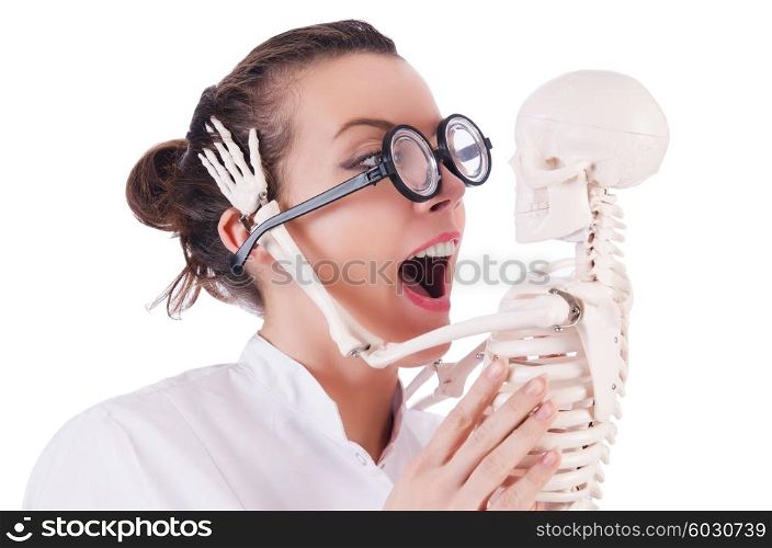 Doctor with skeleton on white