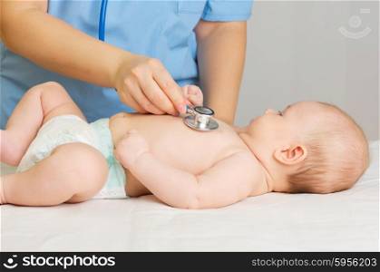 Doctor with stethoscope listen little baby