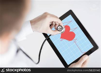 doctor with stethoscope listening heart beat on tablet pc