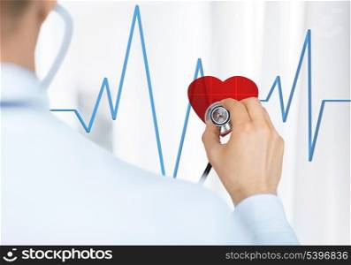 doctor with stethoscope listening heart beat on virtual screen