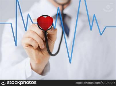 doctor with stethoscope listening heart beat on virtual screen