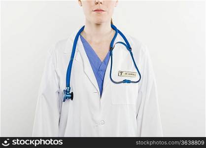 Doctor with stethoscope mid section